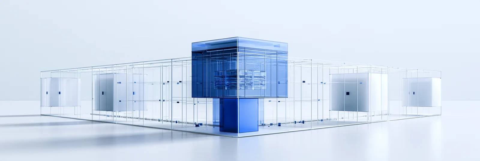 Spatial render: a low transparent structure of many small chambers with one dense blue module at its centre